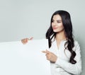 Business woman pointing up her finger and showing signboard Royalty Free Stock Photo