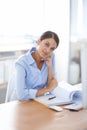 Business woman, portrait and desk with documents at office on break for accounting or finance. Young female person Royalty Free Stock Photo