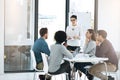 Business woman, presentation and group with speaker in discussion, planning and brainstorming in creative startup Royalty Free Stock Photo