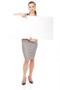 Business woman presenting empty banner. Royalty Free Stock Photo