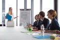 Business woman presenting project to her colleagues Royalty Free Stock Photo