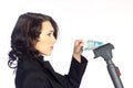 Business woman pull money from vacuum cleaner Royalty Free Stock Photo