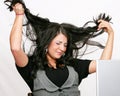 Business woman pulling her hair out Royalty Free Stock Photo