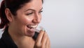 Business woman puts on transparent retainers to straighten teeth Royalty Free Stock Photo