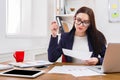 Business woman reading document at office desktop Royalty Free Stock Photo