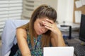 Business woman reading a document in office workspace