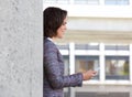 Business woman reading text message on cell phone Royalty Free Stock Photo