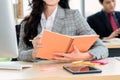 Business woman reads book at office desk Royalty Free Stock Photo