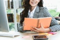 Business woman reads book at office desk Royalty Free Stock Photo