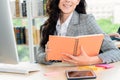 Business woman reads book at office desk Royalty Free Stock Photo