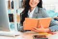 Business woman reads book at office desk Jivy Royalty Free Stock Photo