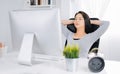 Business woman relaxing and sitting on an home office chair.Asian Royalty Free Stock Photo