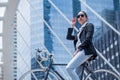 Business woman riding bicycle to work on urban street in city .transport and healthy . fashion lifestyle cool smart