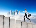 Business woman running on the concrete stairs blocks. Royalty Free Stock Photo