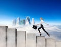 Business woman running on the concrete stairs blocks. Royalty Free Stock Photo