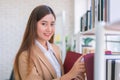 Business woman Searching files and and reading book in the cabinet or books shelves Royalty Free Stock Photo