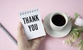 Business woman showing a post-it to thank Royalty Free Stock Photo