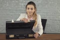 Business woman shows empty briefcase
