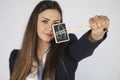 Business woman shows a symbol of the dollar as a strong currency Royalty Free Stock Photo