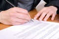 Business woman signing a contract Royalty Free Stock Photo