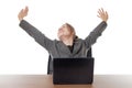 Young business woman sitting a her desk Royalty Free Stock Photo