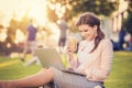 Business woman sitting in a park Royalty Free Stock Photo