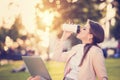 Business woman sitting in a park Royalty Free Stock Photo