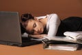 business woman sleeping in front of laptop Royalty Free Stock Photo
