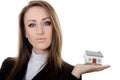 The business woman with small model of the house Royalty Free Stock Photo