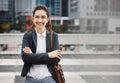 Business woman, smile portrait and arms crossed outdoor, happy from job pride as a worker. City, entrepreneur and work Royalty Free Stock Photo