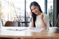 Business woman smiling with arms up celebrating for success work