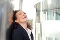Business woman smiling outside office building Royalty Free Stock Photo