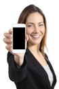 Business woman smiling showing a blank smart phone screen
