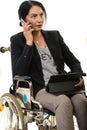 Business woman speaking by phone mobile in wheelchair Royalty Free Stock Photo