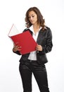 Business woman standing with a file folder Royalty Free Stock Photo