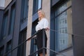 Business woman standing in front of office building Royalty Free Stock Photo
