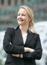 Business woman standing outside the office with arms crossed Royalty Free Stock Photo