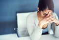 Business woman, stress and tired in office with hands, worried and anxiety at desk at startup. Young businesswoman Royalty Free Stock Photo