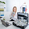 Business woman successful with US dollars money in hand feeling happy and smile, bankruptcy economic financial concept. Royalty Free Stock Photo