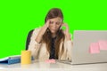 Business woman suffering stress at office computer isolated green chroma key Royalty Free Stock Photo