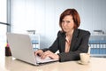 Business woman suffering stress working at office computer desk worried Royalty Free Stock Photo