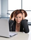 Business woman suffering stress working at office computer desk worried Royalty Free Stock Photo