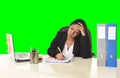 Business woman suffering stress working at office isolated green chroma key background Royalty Free Stock Photo