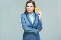 Business woman suit dressed show plastic credit card. Royalty Free Stock Photo