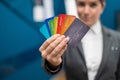 Business woman in a suit holds many different credit cards. Royalty Free Stock Photo