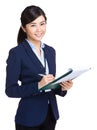 Business woman take note on clipboard Royalty Free Stock Photo