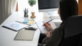 Business woman taking a notes on her personal notebook Royalty Free Stock Photo