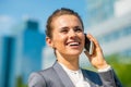 Business woman talking mobile phone in office Royalty Free Stock Photo