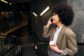 business woman talking by phone on the escalator Royalty Free Stock Photo