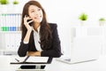 Business woman talking on the phone in office Royalty Free Stock Photo